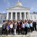 VSHA staff in front of the State House